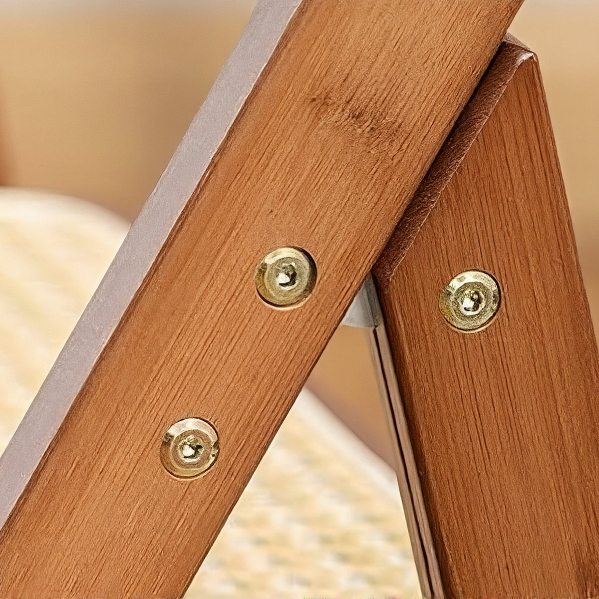 Brass screws at the folding joint (close-up detail)