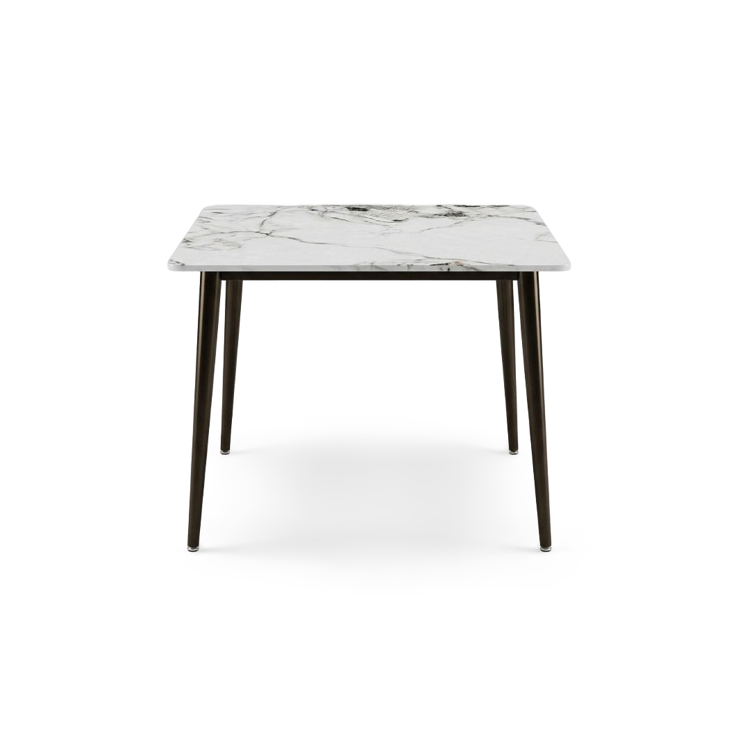 Square sintered stone dining table with dark bronze metal legs, front view on transparent background