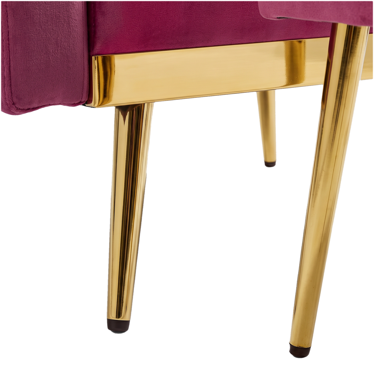 Gold trim bar and tapered gold metal legs of the fuchsia velvet chair (close-up detail)