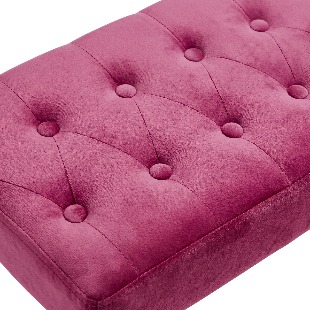 Button-tufted fuchsia velvet ottoman top (close-up detail)