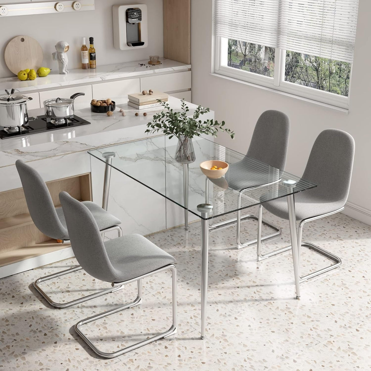 Grey chairs at the table in a kitchen with a stone backsplash and open shelving