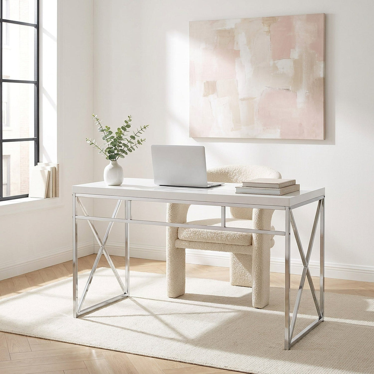 White desk under a window in a bright room, wide view