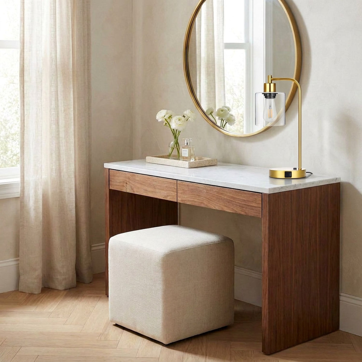 Gold lamp on a marble-topped walnut vanity in a bright dressing room (room)