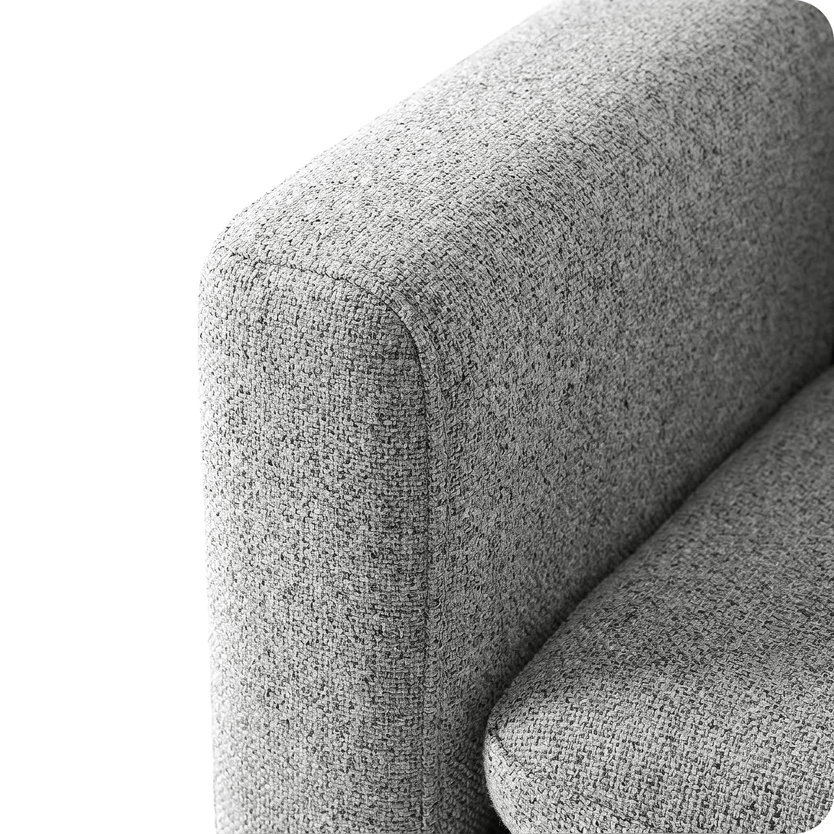 Curved padded armrest of the grey linen accent chair (close-up detail)