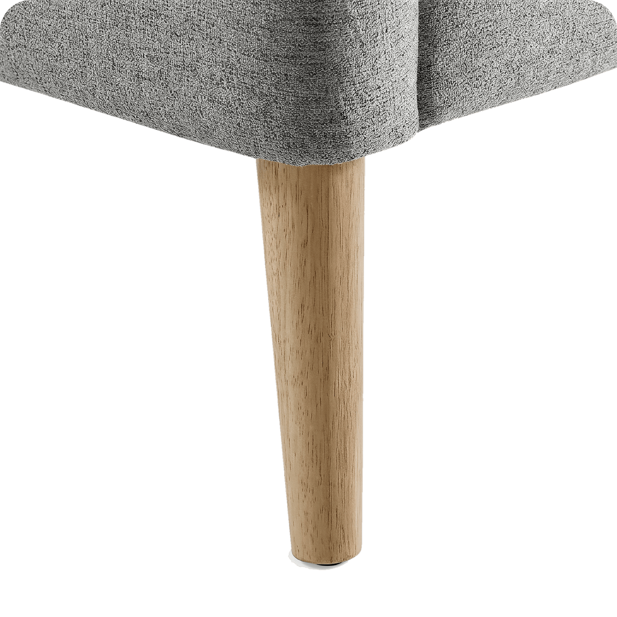 Solid wood tapered leg of the grey linen accent chair (close-up detail)