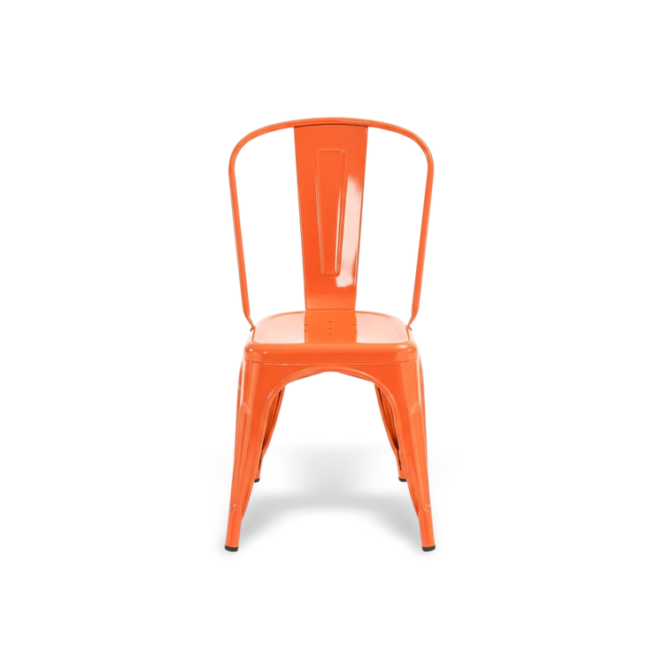 Vibrant rust dining chair with stackable design in metal, industrial farmhouse style.