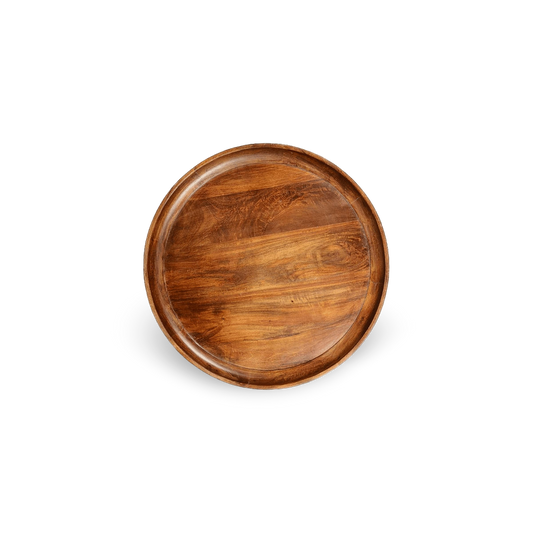 Top-down detail view of the organic wood grain on a round mango wood coffee table with splayed industrial metal legs.