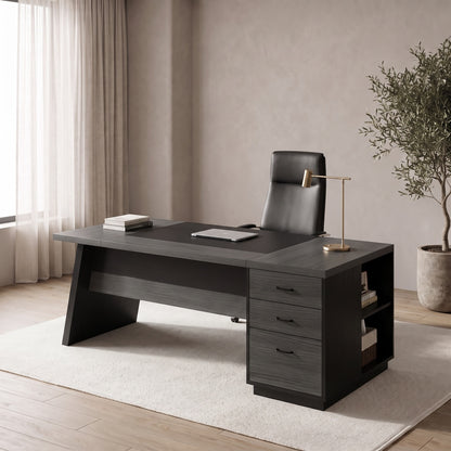 Executive desk with drawers and a file drawer in a sunlit study, chair pulled in