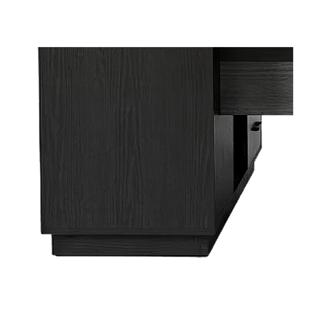 File cabinet pedestal close-up, black woodgrain side panel on a recessed plinth