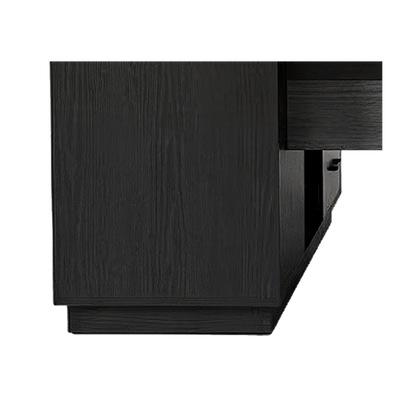 File cabinet pedestal close-up, black woodgrain side panel on a recessed plinth