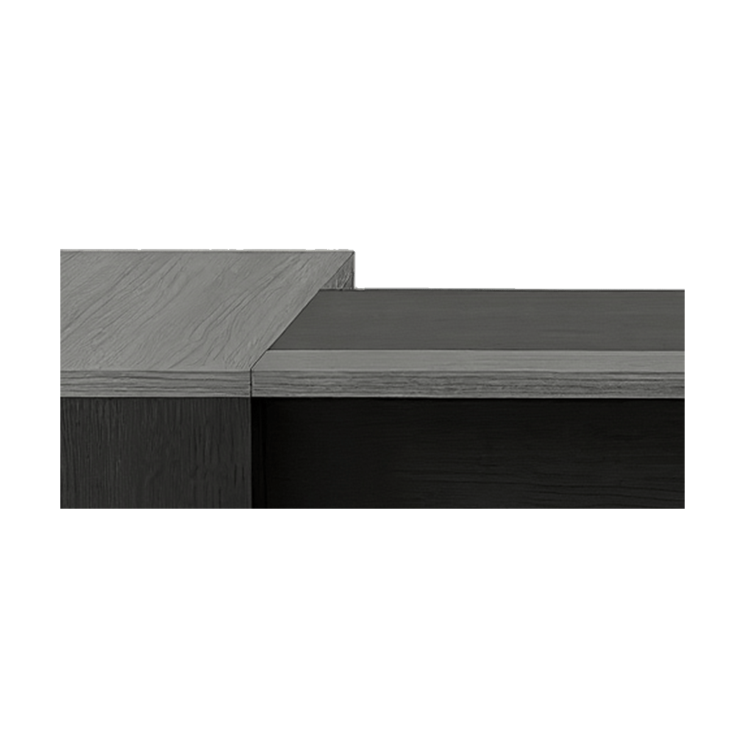 Raised return top close-up, thick grey woodgrain edge beside the inset desk pad
