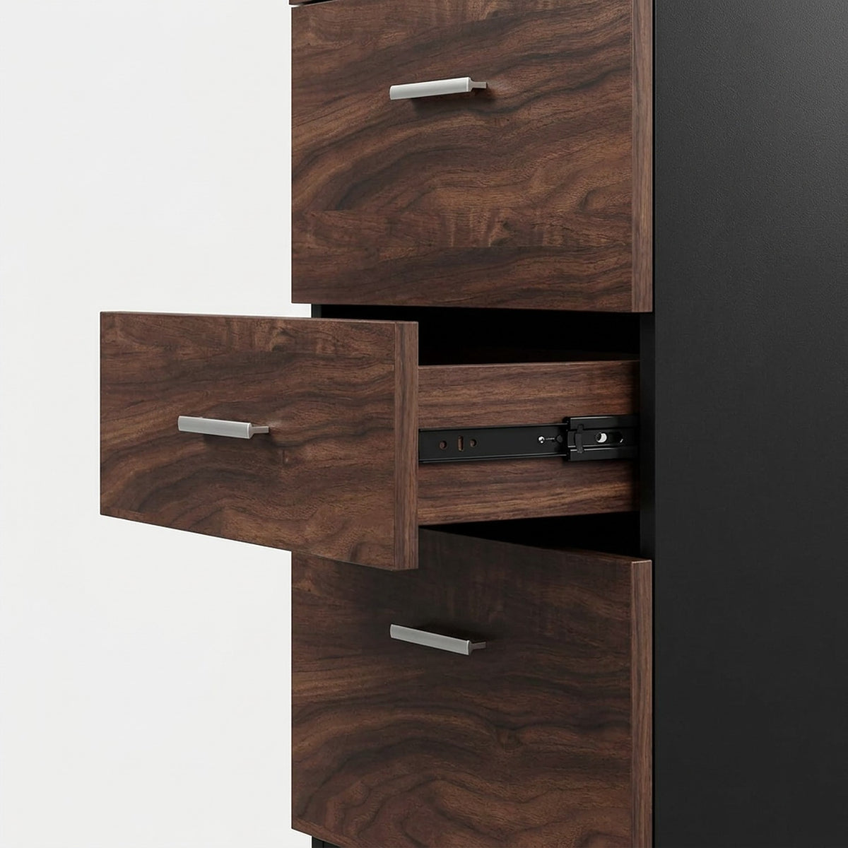 Close-up of walnut drawer fronts with silver bar pulls, one drawer open to show a black metal slide rail