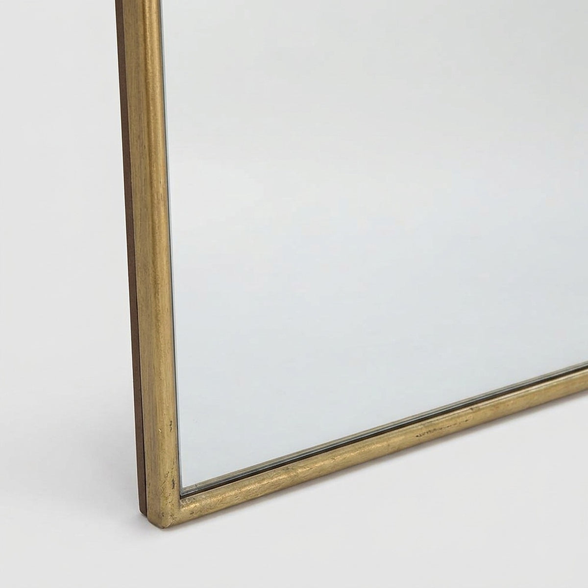 Slim gold iron frame corner with the glass edge, close-up detail