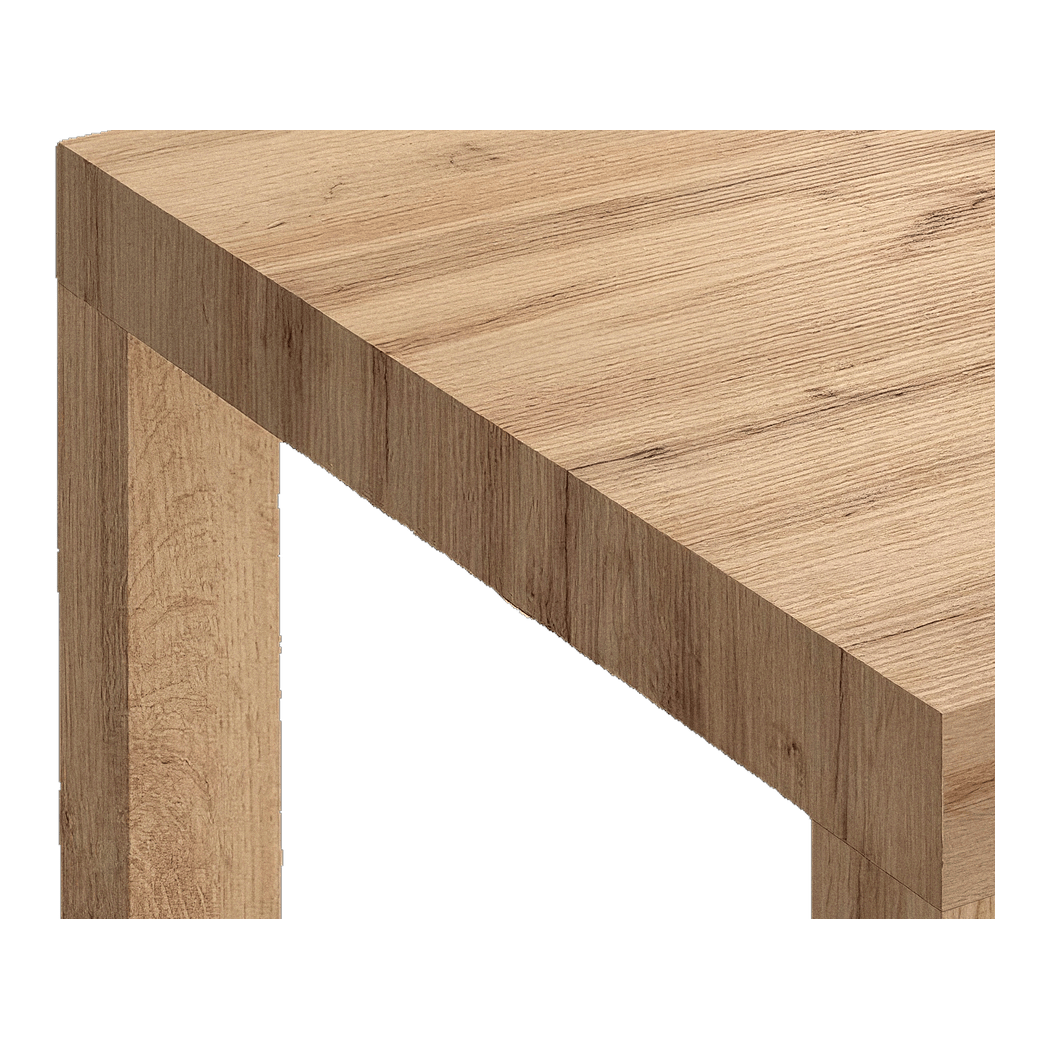 Close-up detail of the light oak corner where the square leg meets the 3.5-inch slab top