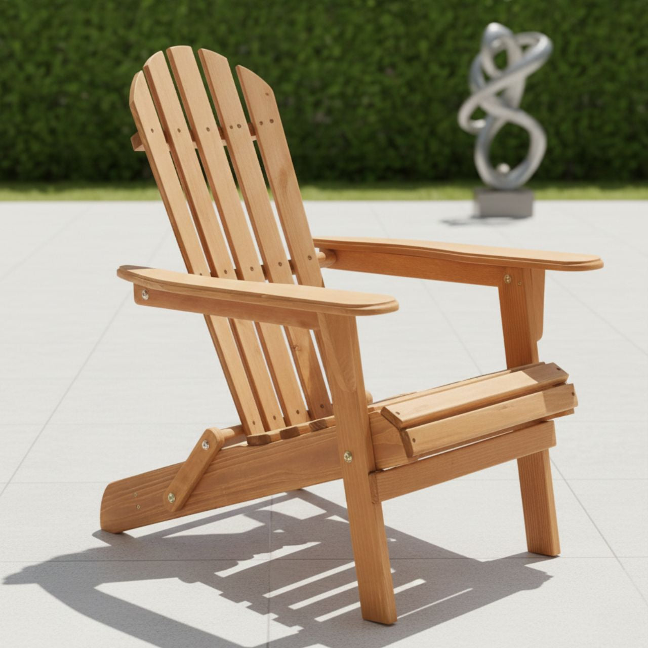 Portable folding Adirondack chair in premium hemlock wood; lightweight design for easy transport and space-saving storage on sunny decks or balconies.