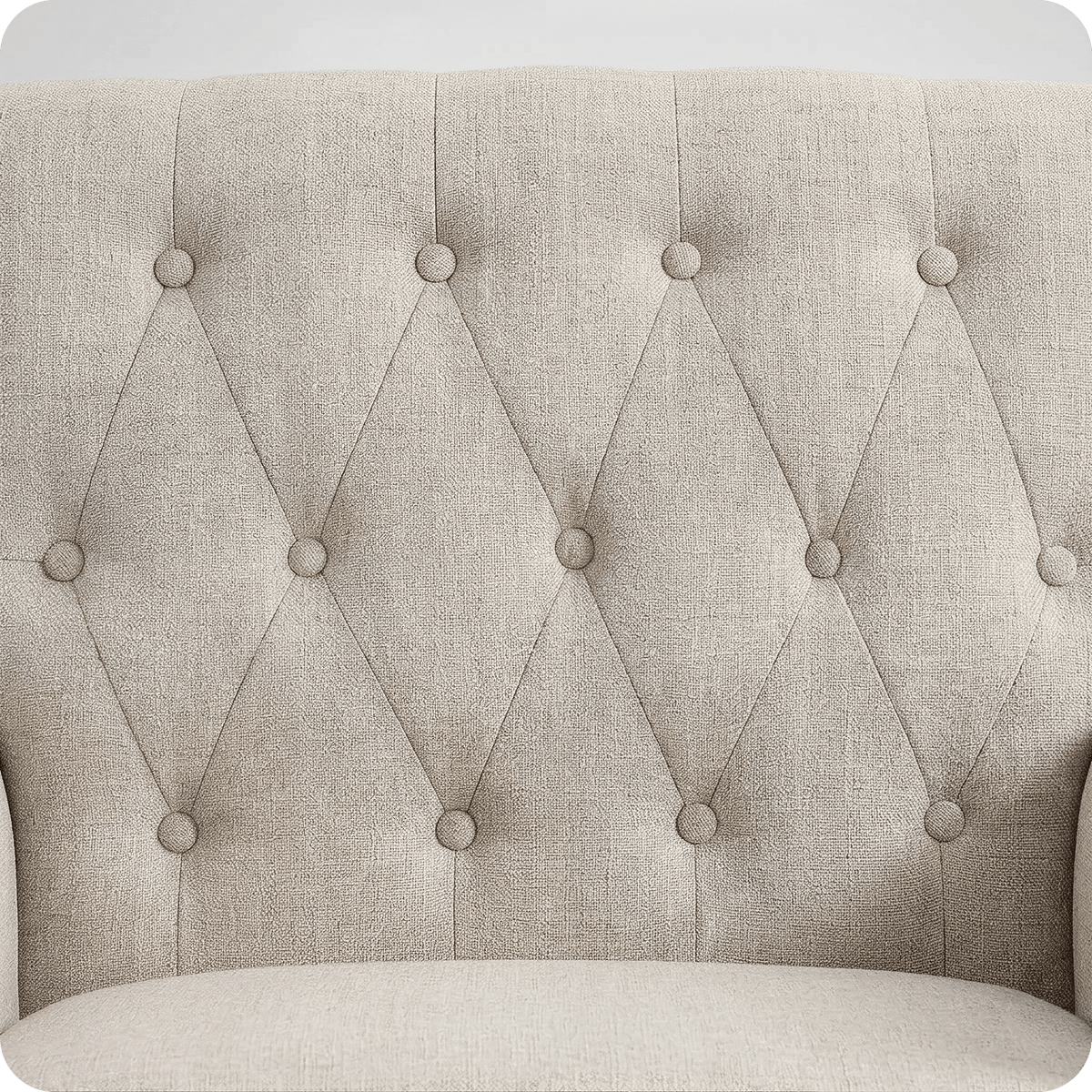 Diamond button-tufted linen backrest of the accent chair (close-up detail)