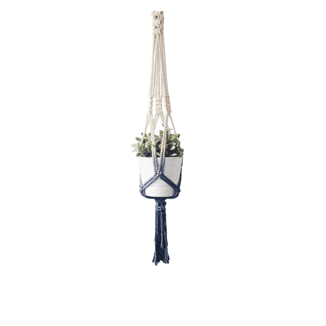 Dip dyed macrame plant hanger in premium cotton with a navy gradient and white pot, front view (plain studio)