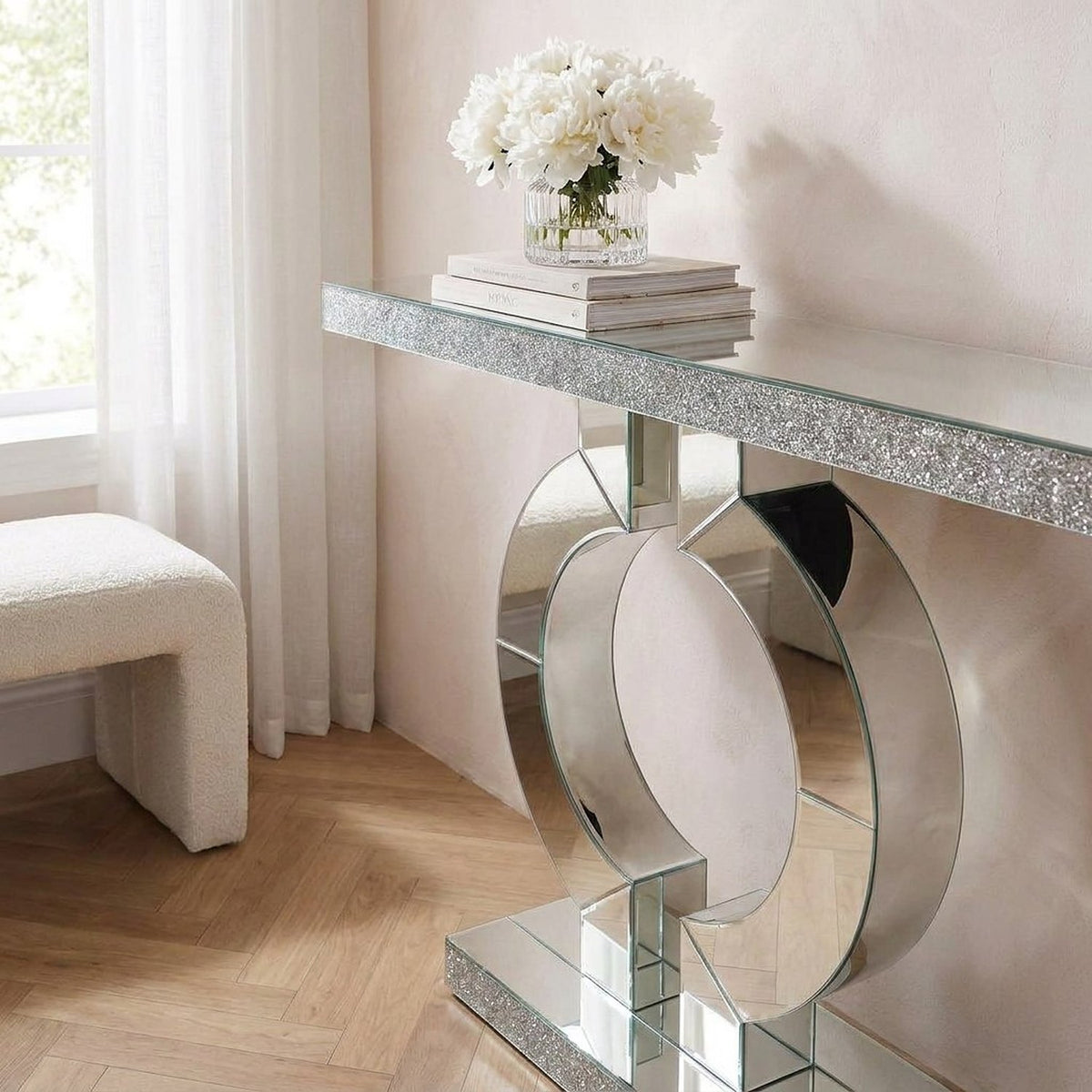 Closer three-quarter view of the mirrored console in the same nook