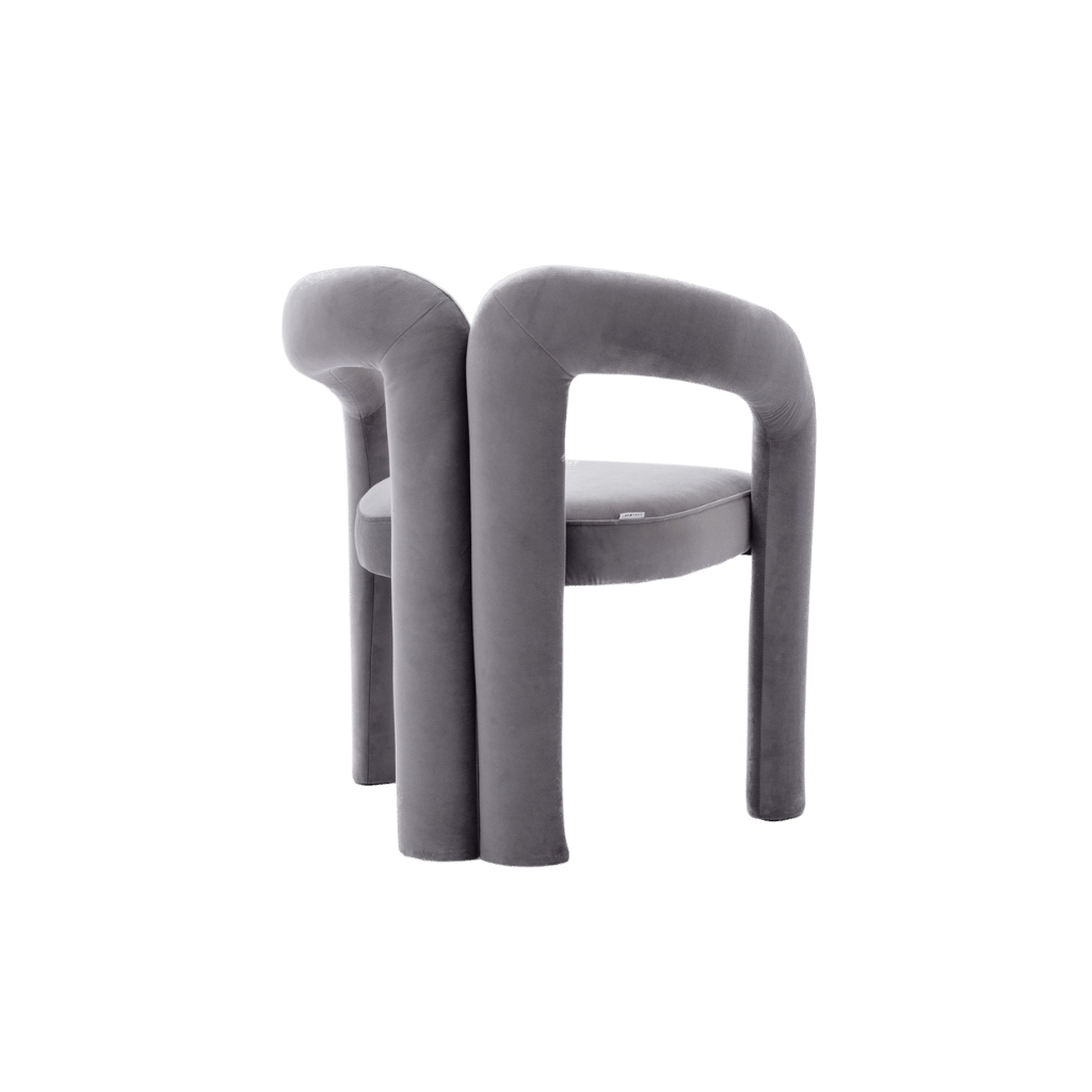 elvet dining armchair with plush upholstery and curved back for a modern dining look.