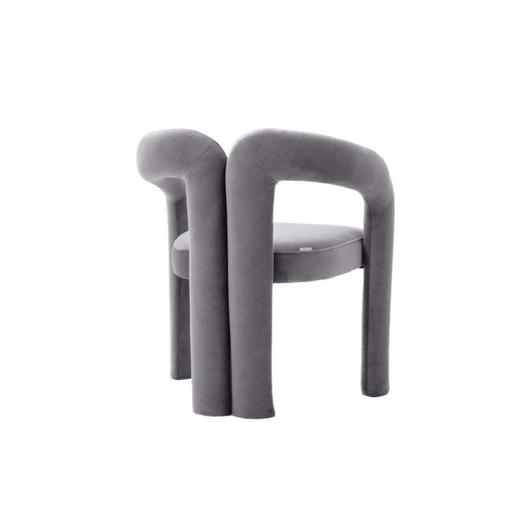 elvet dining armchair with plush upholstery and curved back for a modern dining look.