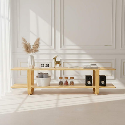 65-inch bamboo TV stand with storage shelves in a bright white room.