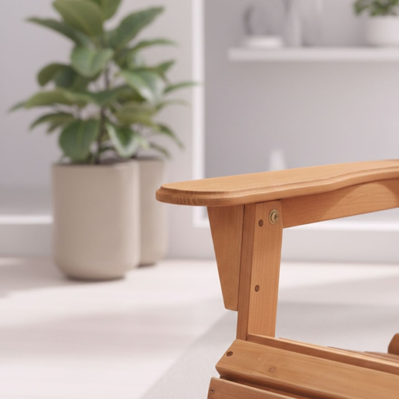 Wooden folding Adirondack chair in Hemlock; heavy-duty folding camping chair for outdoor use.