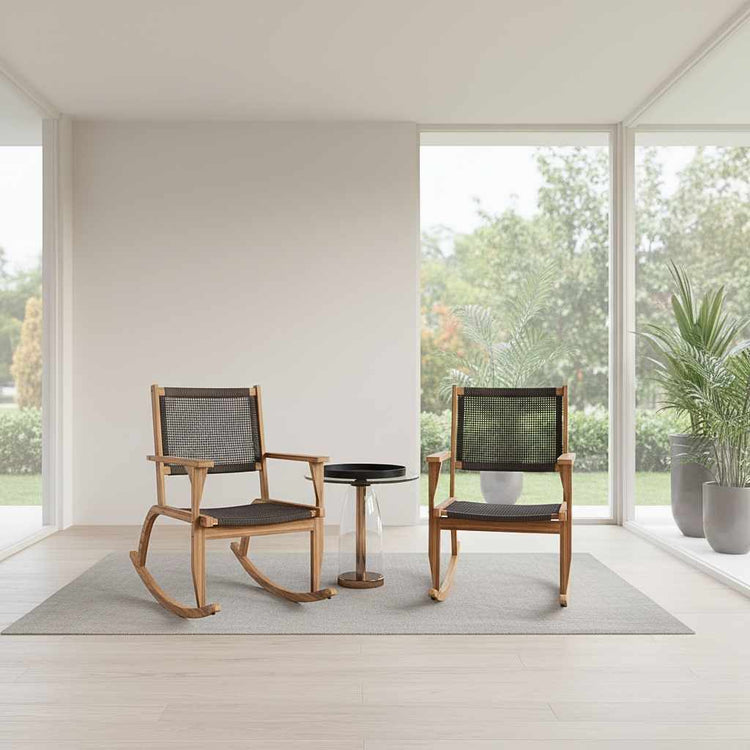 Modern woven-back rocking chairs in a bright sunroom; the natural acacia wood finish complements the airy, light-filled interior.