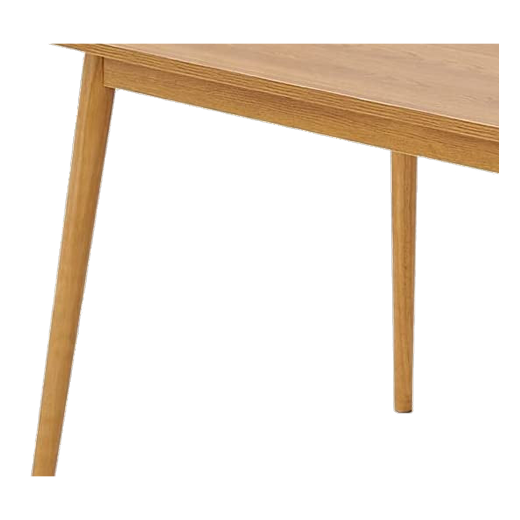 Close-up of the tabletop edge meeting the tapered leg joinery (close-up detail)