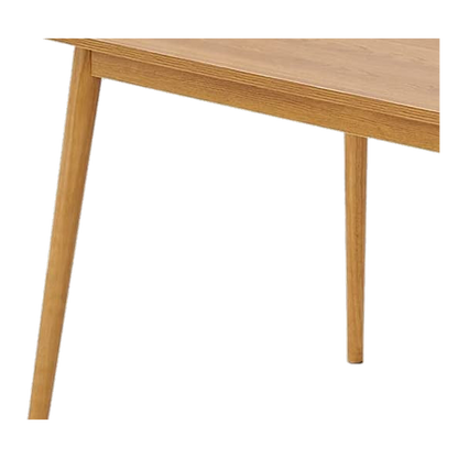 Close-up of the tabletop edge meeting the tapered leg joinery (close-up detail)