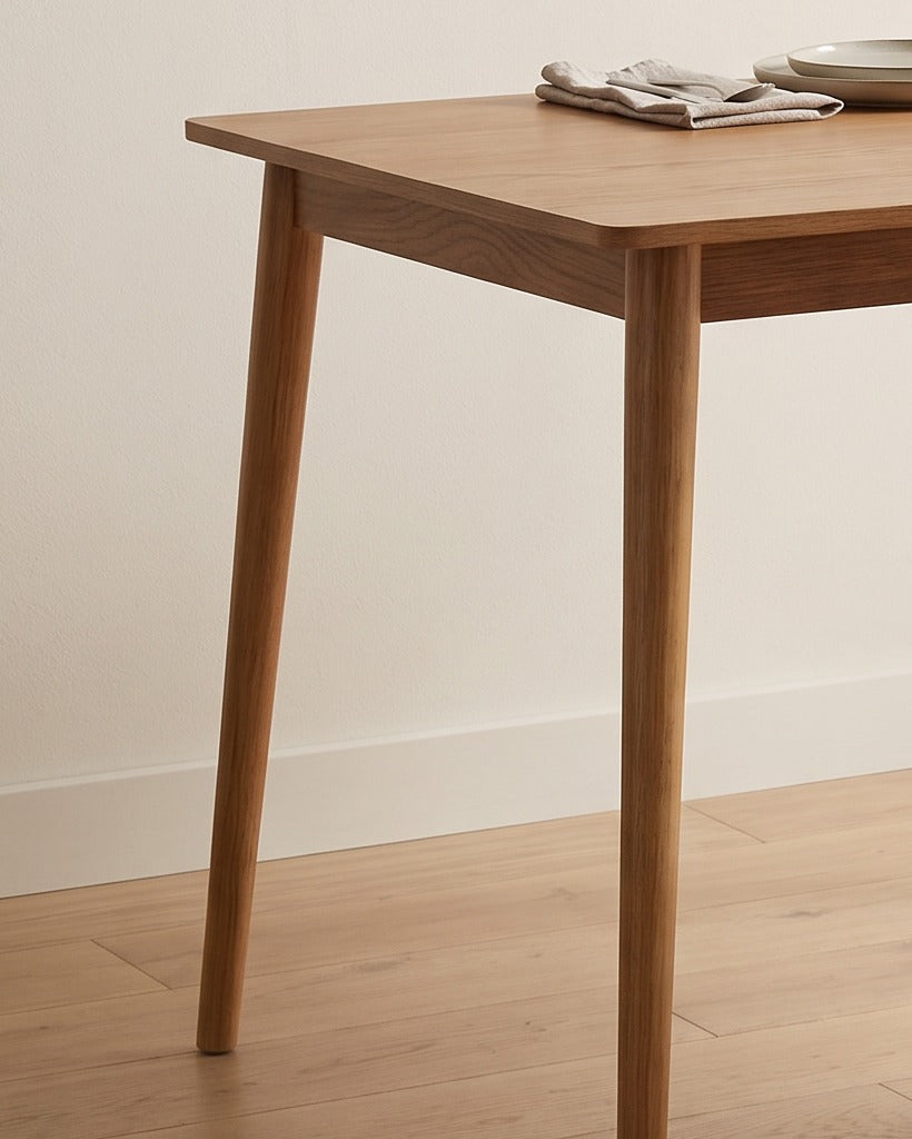 Close-up of the table corner and leg in the styled dining room (close-up detail)