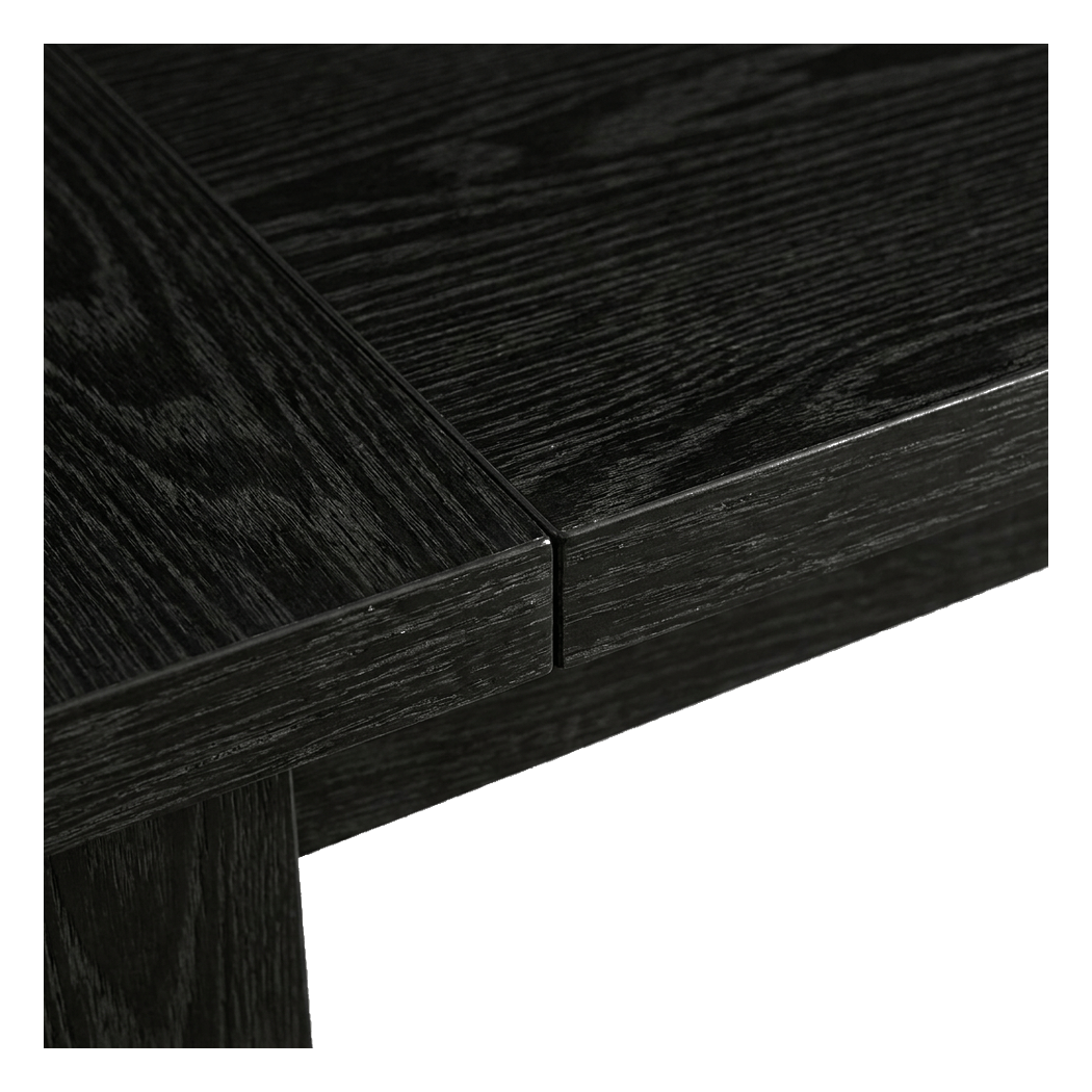 Black wood office desk, macro close-up of the tabletop seam