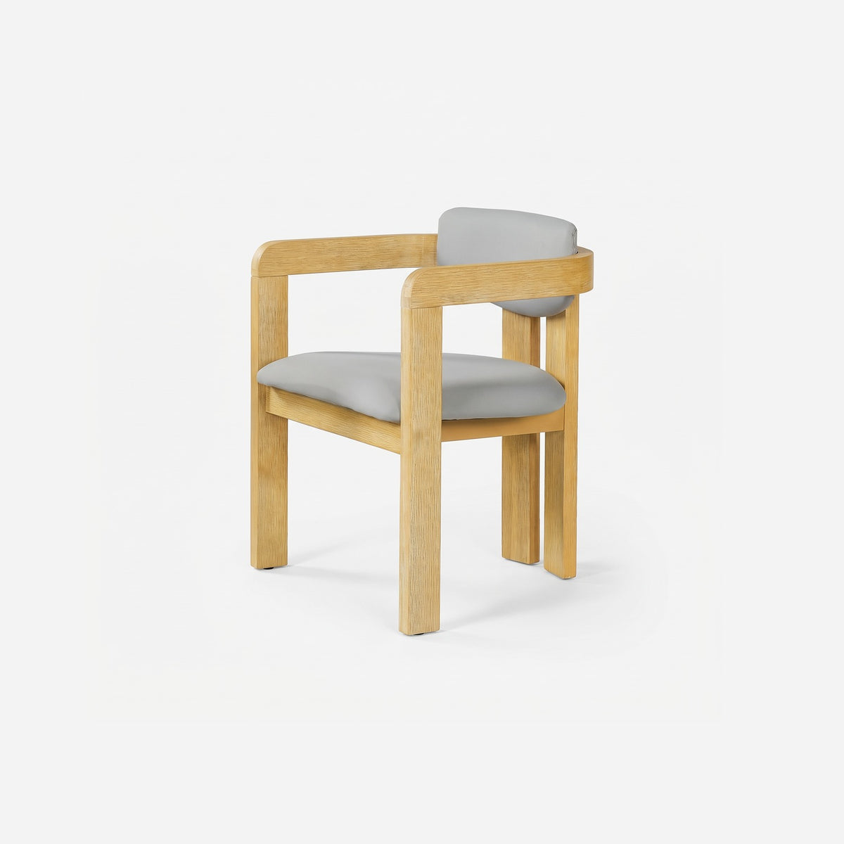 Acacia barrel back armchair turned three-quarter, wide flat arms and a light grey fixed seat pad
