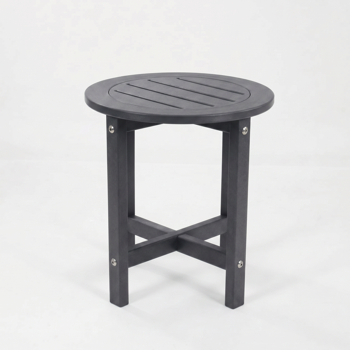 A round outdoor side table with a dark gray slatted top and four legs, shown on a clean white background.