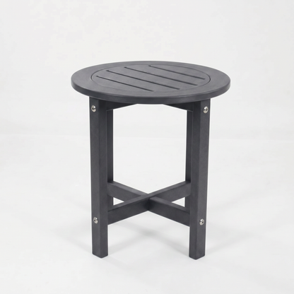 A round outdoor side table with a dark gray slatted top and four legs, shown on a clean white background.