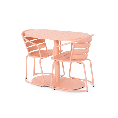 Pink iron table and two slatted armchairs seen from above at an angle (plain studio)
