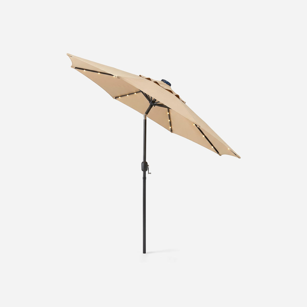 Solar patio umbrella with its canopy tilted, crank-lift pole on a #f3f3f3 ground (plain studio)