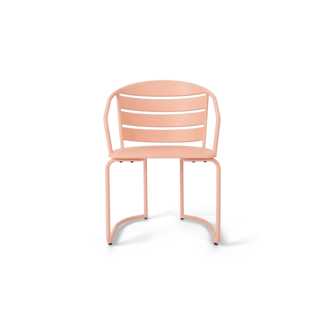 Pink slatted armchair with curved arms and curved tube legs, front view (plain studio)
