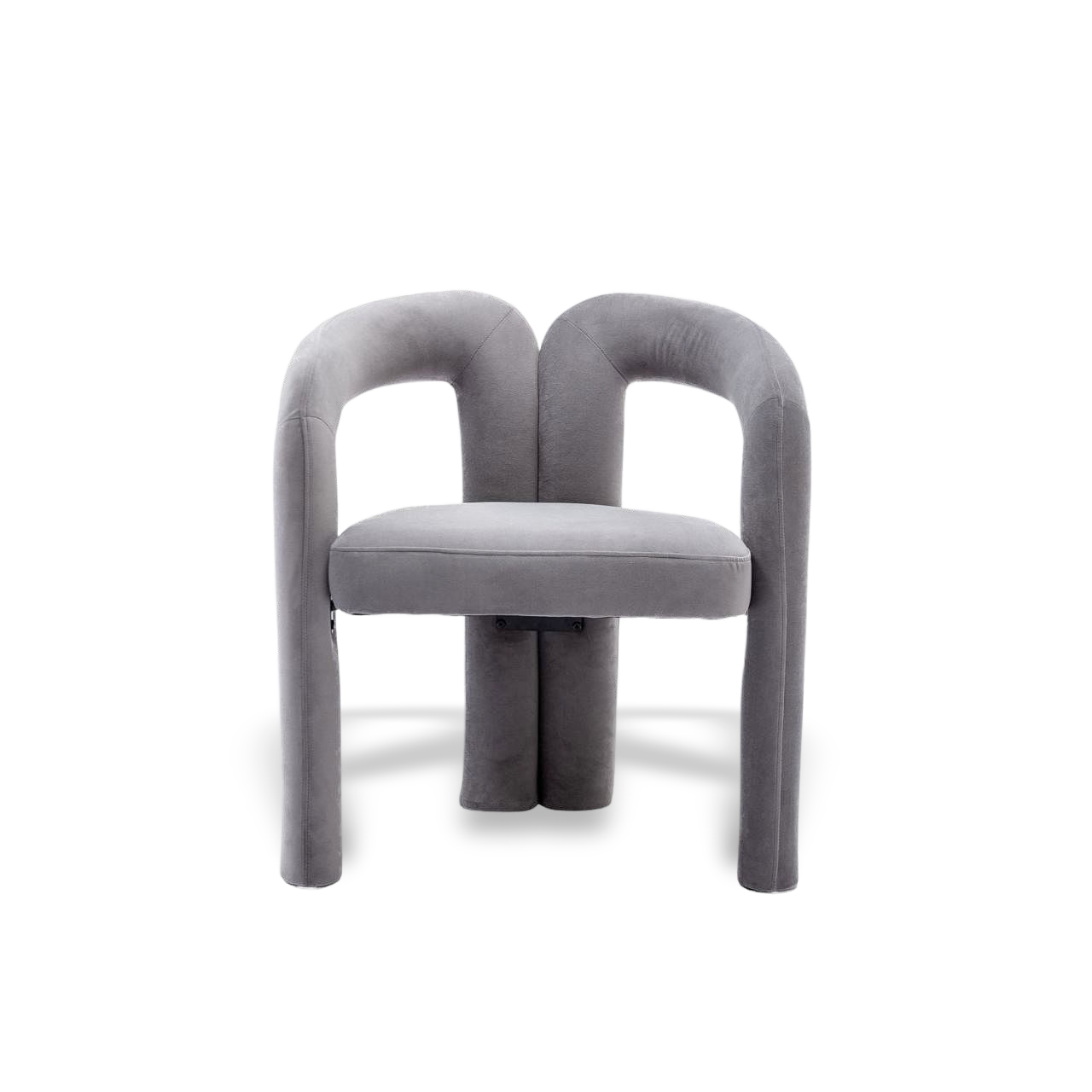 Velvet dining armchair with curved back and plush velvet upholstery.