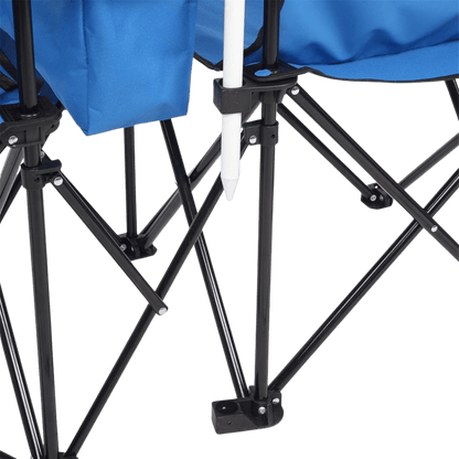 Portable sideline chair for two people with a central umbrella for UV protection; includes a center storage console and sturdy steel frame.