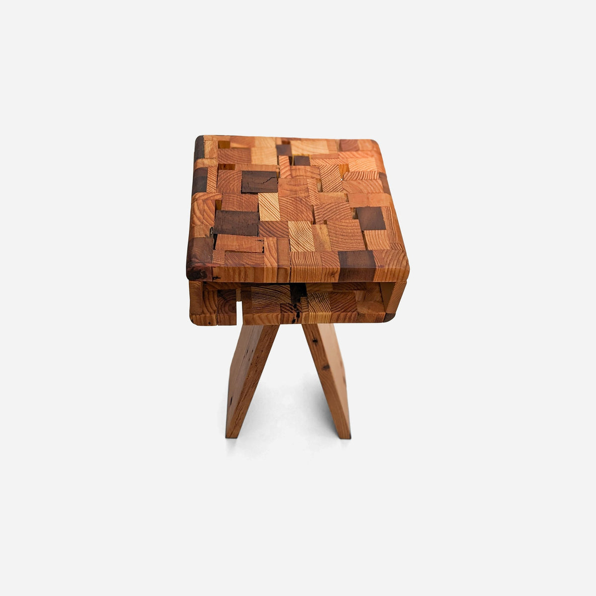 Reclaimed wood nightstand in patchwork Douglas fir with an open compartment, front view