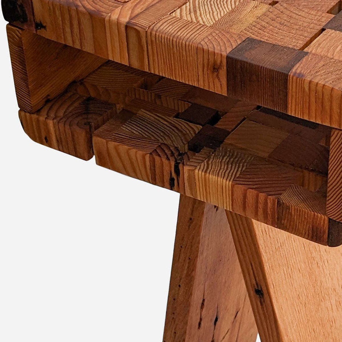 Open storage compartment under the patchwork top, close up