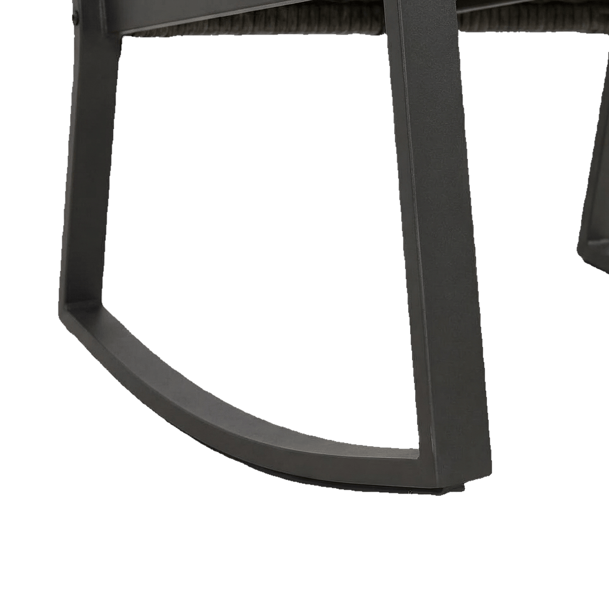 Curved steel rocker runner with a thin non-slip strip along its base (close-up detail)