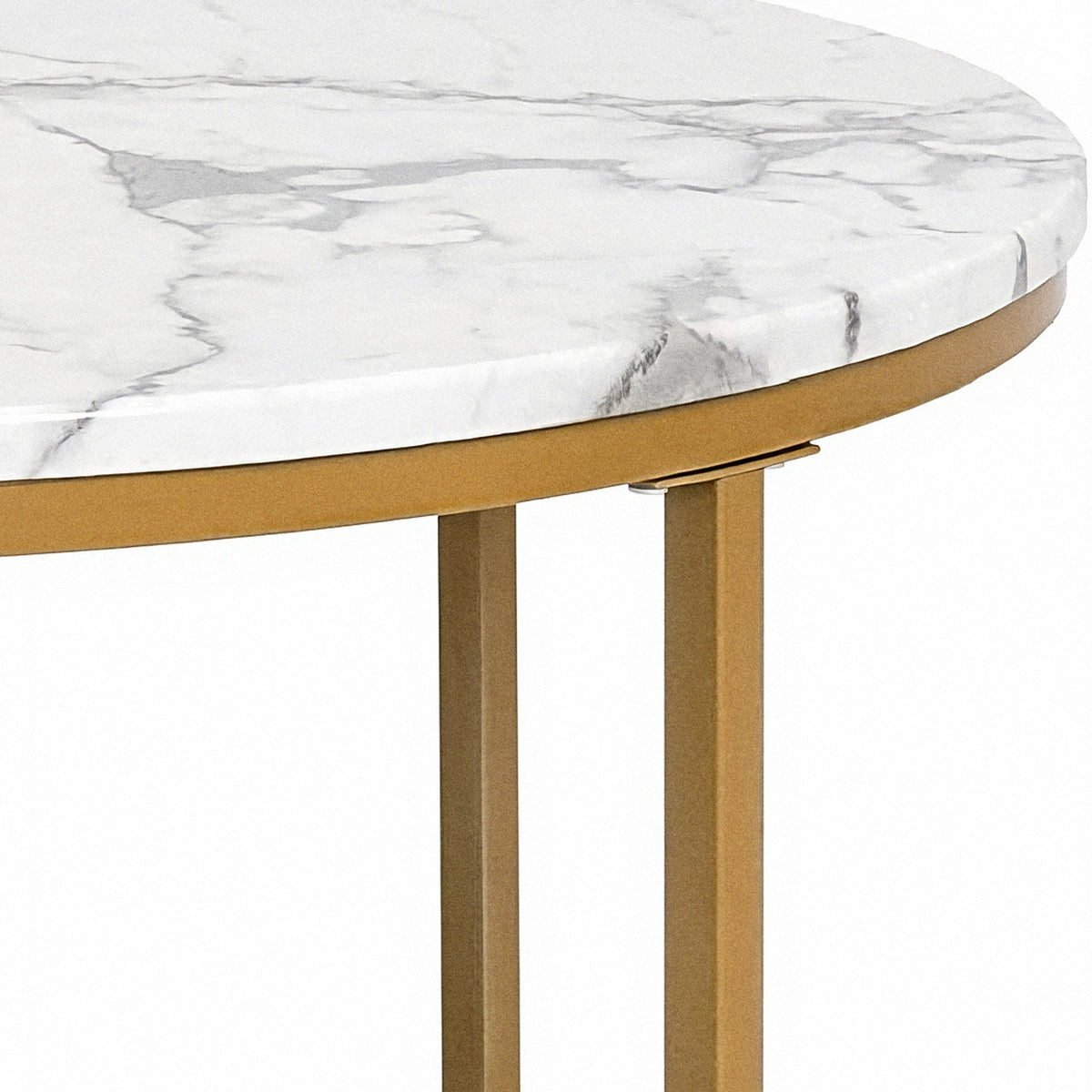 Soft grey veining on the white faux-marble tabletop edge above a slim gold rim ring (close-up detail)