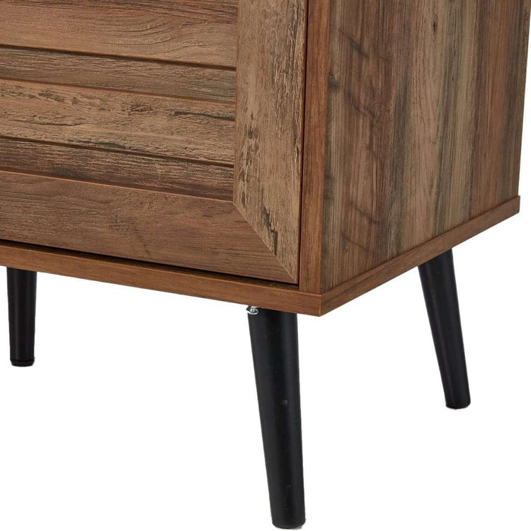 Mid-century TV stand in a rustic wood finish with storage and tapered black legs.