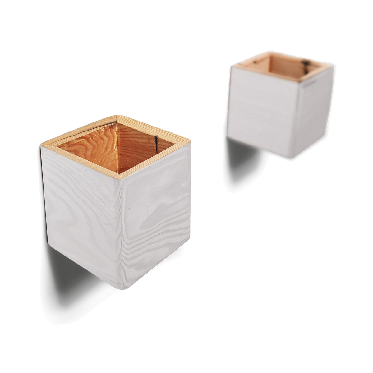 White painted wooden wall planters in two sizes, hung corner-down