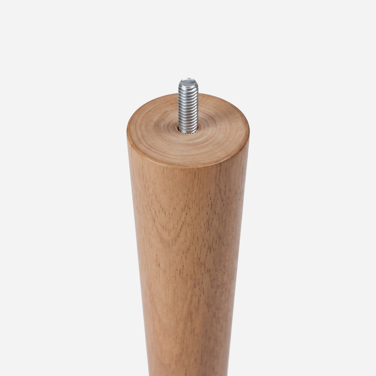 Twist-on solid rubberwood leg with its threaded bolt, close up