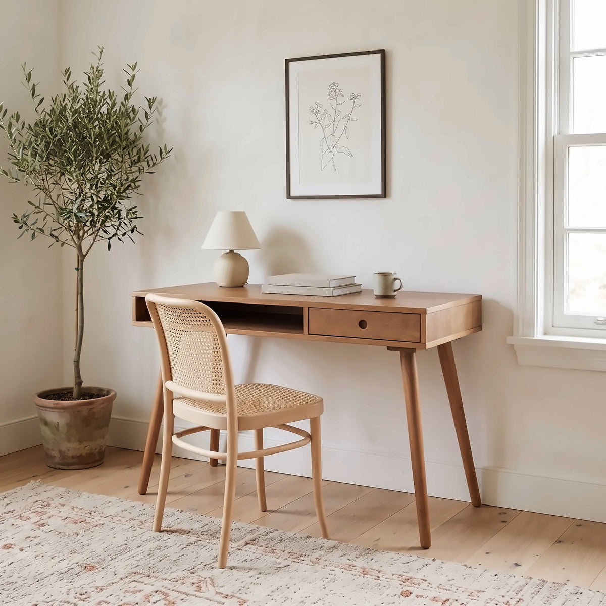 The walnut desk in a bright bedroom-corner study, wide view