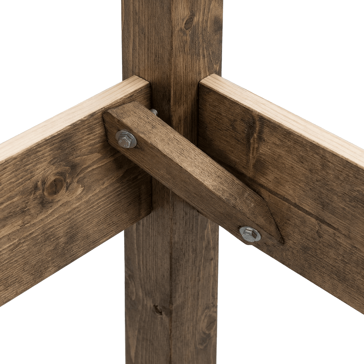 Bolted wood corner brace under the farmhouse dining table (close-up detail)