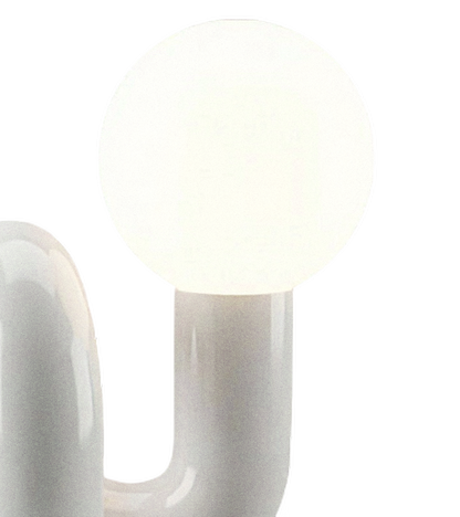 Frosted glass globe seated on the ceramic column, transparent close-up