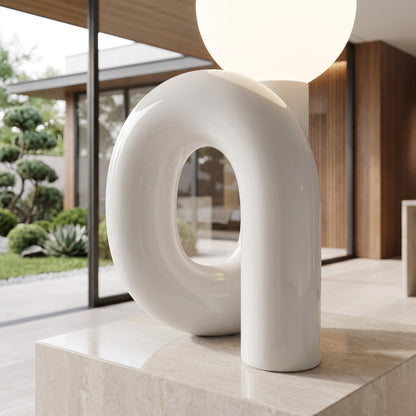 Spiral ceramic loop detail in a styled interior setting (feature callout)